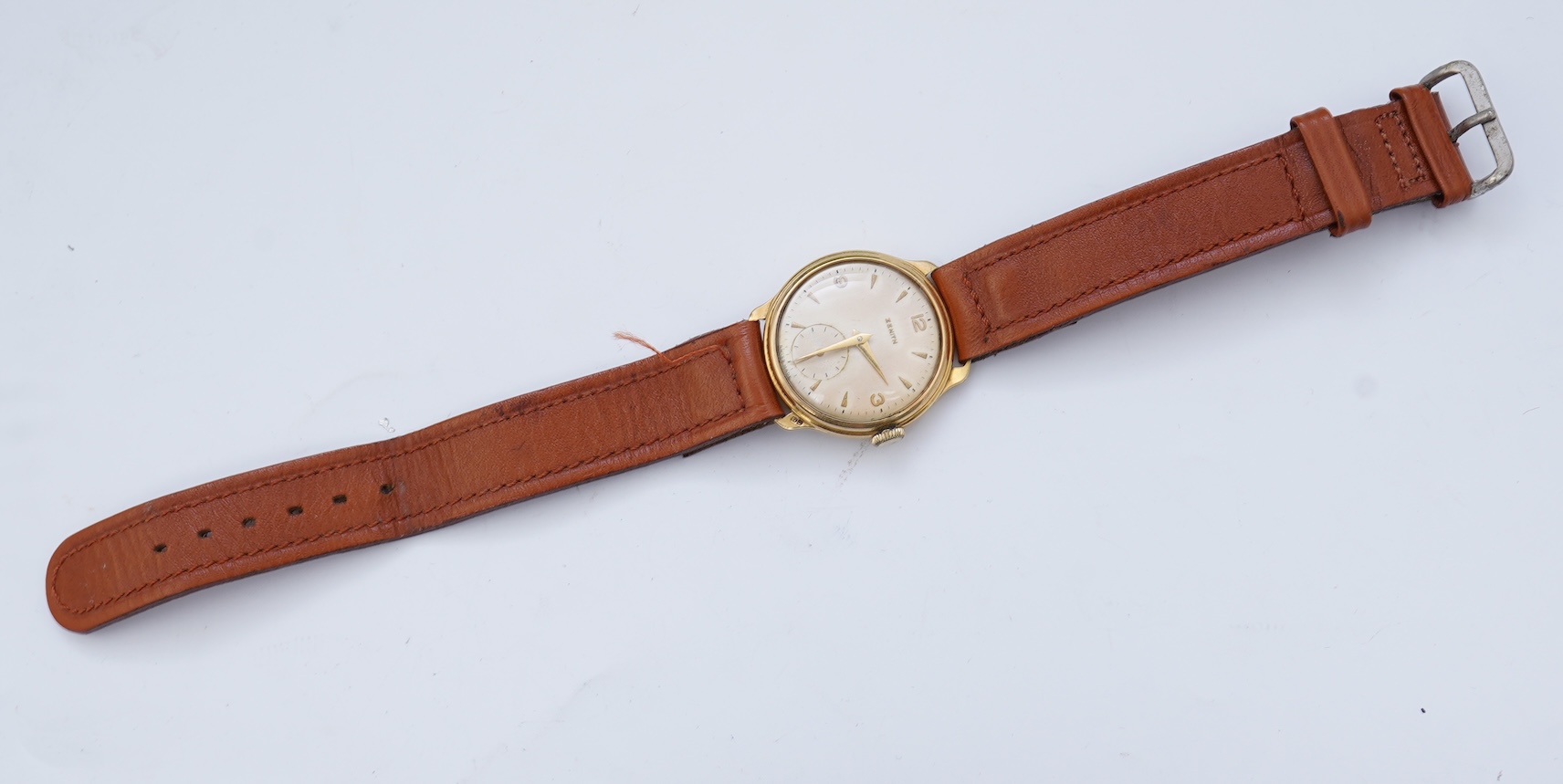 A gentleman's 1950's 18ct gold Zenith manual wind wrist watch